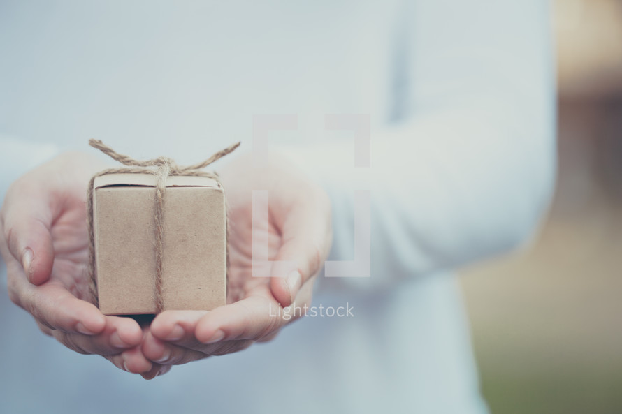 a small gift in a man's hands 