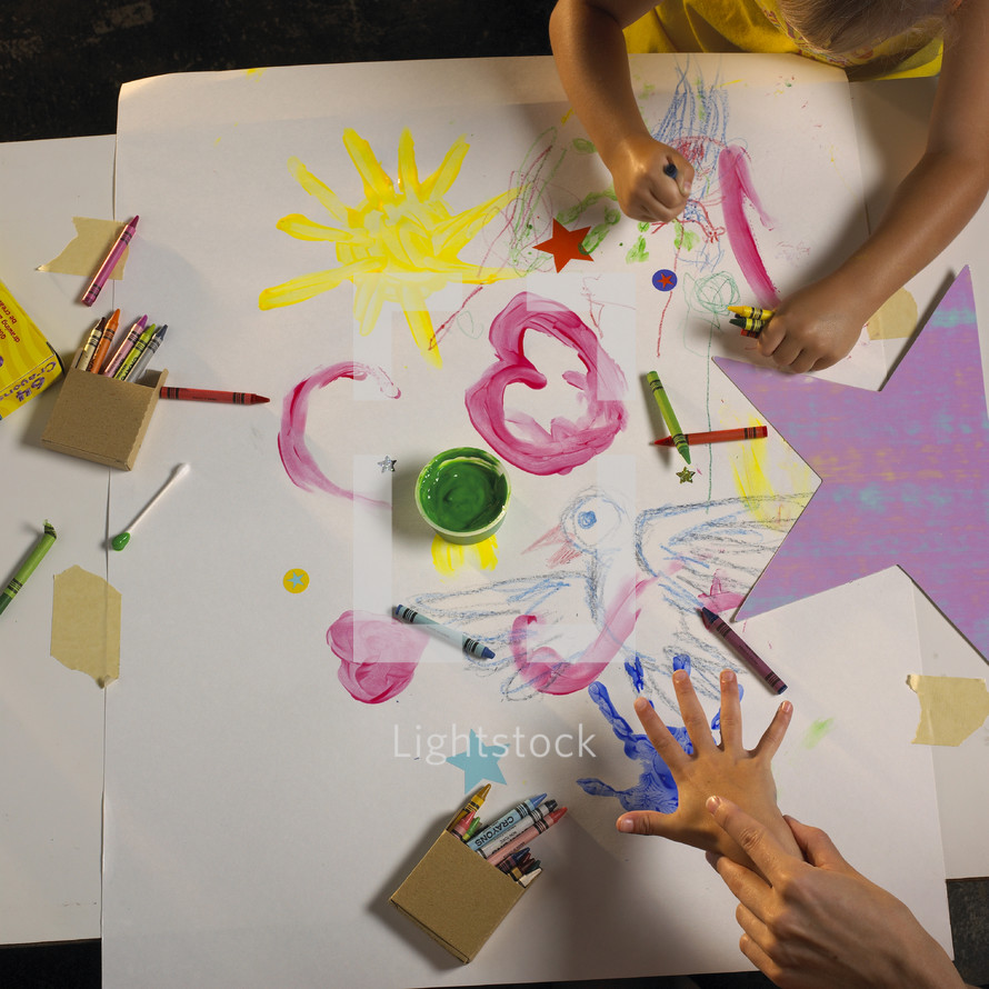 children drawing and finger painting 