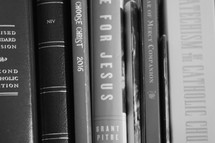 row of Christian books on a bookshelf 