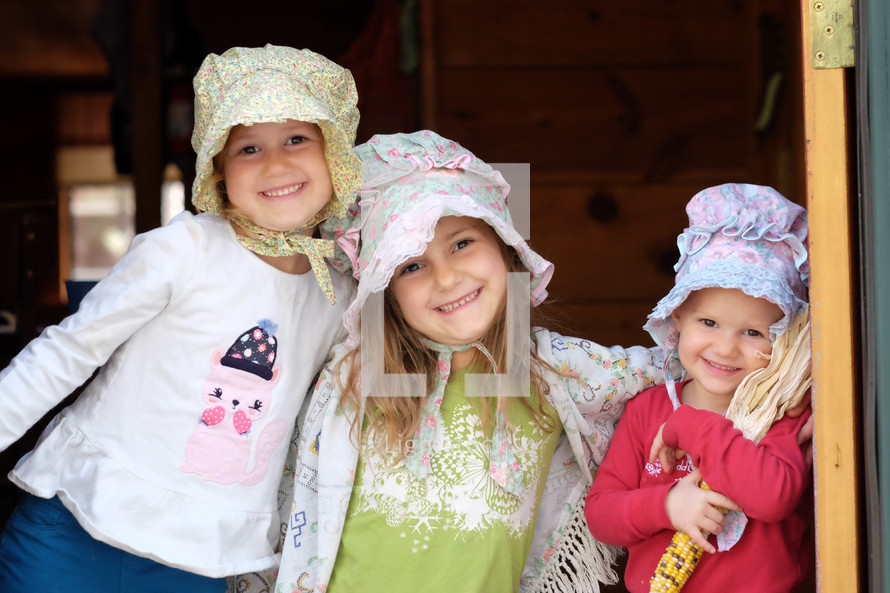 kids in vintage bonnets 