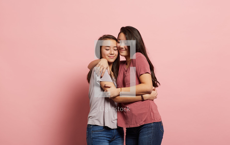 sisters hugging 