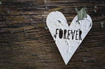word forever on a paper heart 