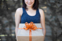 a woman receiving a gift 