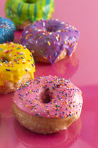 rainbow sprinkled donuts 