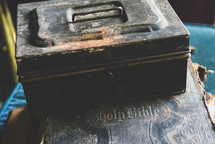old tool box on an old Bible 