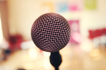 Close up of microphone. I shot this at a Christian event in Ireland, when I took it the image looked inviting to me giving a sense of 'come on, tell your story.'