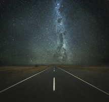 a road under the stars 