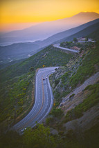 a mountain highway at sunset 