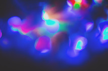 a triple exposure taken in camera of blinking coloured lights