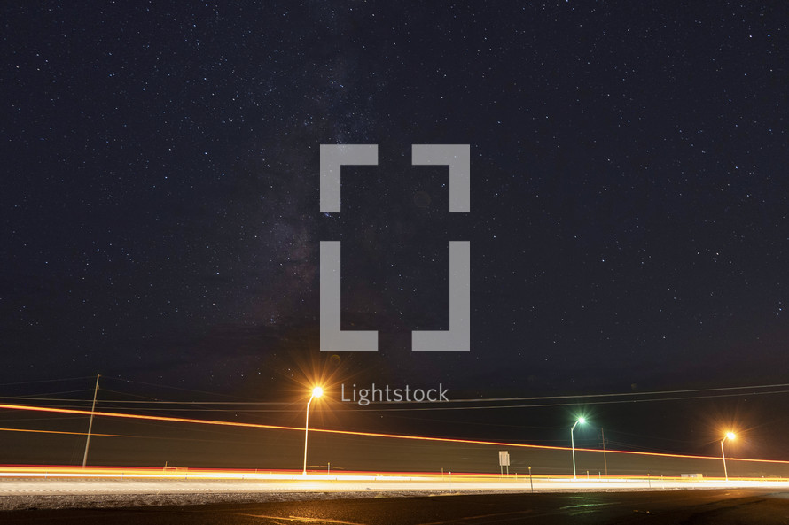 Stars above an interstate highway at night