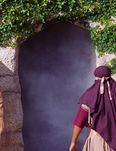 One of Jesus Disciples peers into the open and empty tomb of Jesus after He rose from the dead after three days, Just as He Said He would do before being crucified on the cross. The miracle of Easter and Christianity is not that Jesus died but that He arose from the dead and conquered both hell and the grave. 