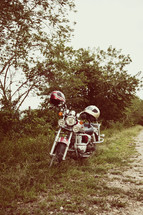 Motorcycle on side of dirt ride