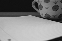 notebook and coffee mug