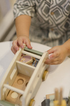 Small child playing with toys