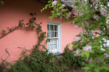 pink exterior of a cottage