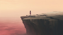 Surreal image of a woman looking off a cliff. 