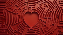 Close up of a red maze with a heart in the middle. 