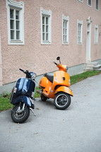 two parked scooters 