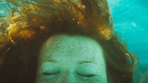 a girl under water 