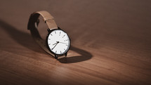 watch on a wood background 