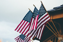 American flags on the side of a house 