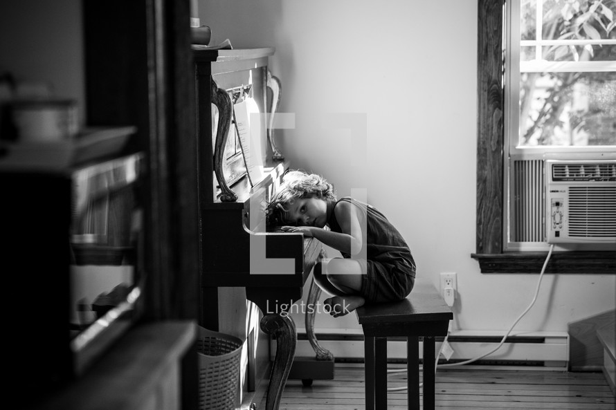 a child playing a piano 