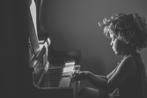 child playing a piano 