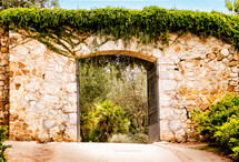 stone archway entrance to a garden 