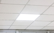 Modern design white office ceiling with led lighting.