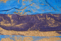 sand on a beach towel 