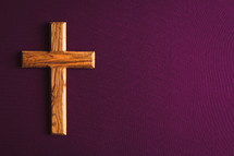 olive wood cross on purple