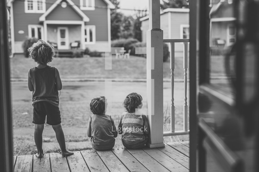 children on a front porch 