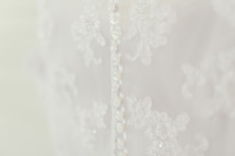 buttons on the back of a wedding gown 