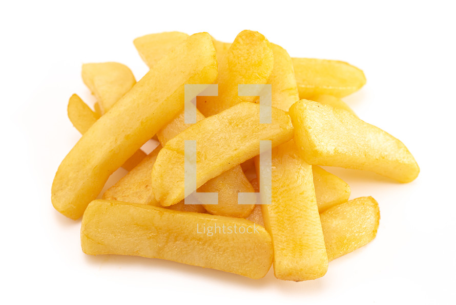 A Pile of Chunky Steak Fries Isolated on a White Background