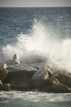 ocean crashing into rocks