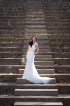 bride on outdoor amphitheater stairs