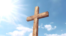 Wooden crucifix under a blue sky