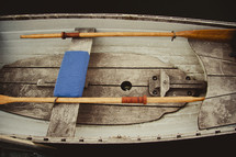 Wooden canoe and paddles