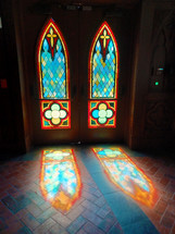Stained glass reflection on church floor