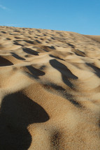 ripples in sand dunes in desert sand