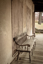 old bench on a porch 