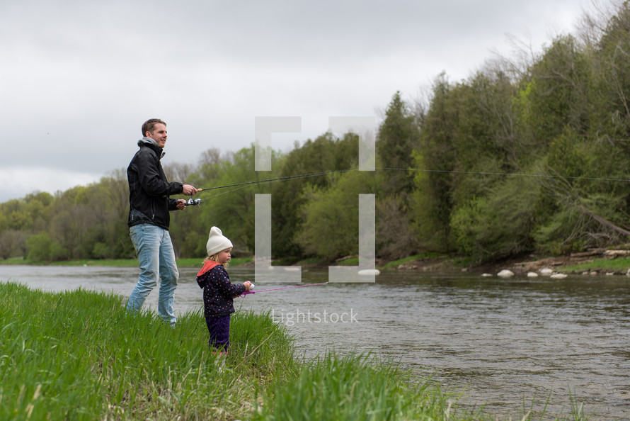 father and daughter fishing 