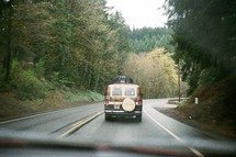 a van driving down the road 