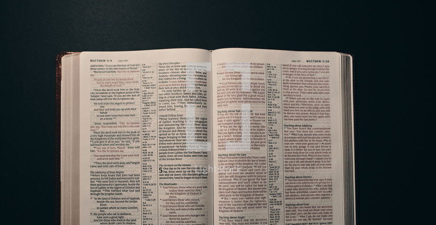 pages of an opened Bible turned to Matthew 