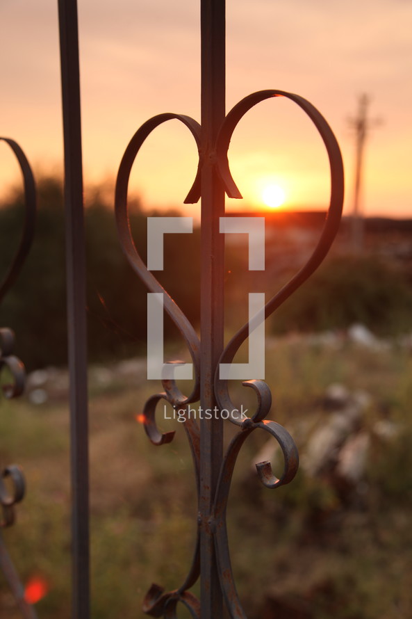 iron fence at sunset 