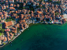 aerial view over a coastal community 