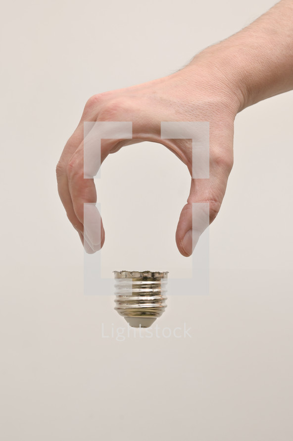 Abstract Man Hand Shaped like A Light Bulb