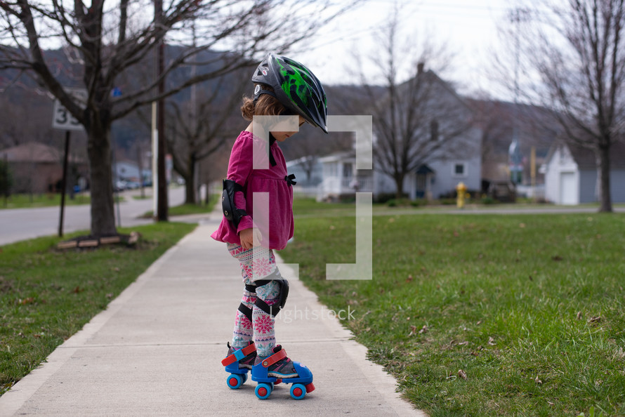 little girl roller skating 