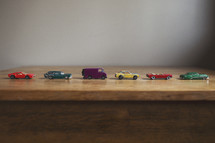 toy cars lined up in formation