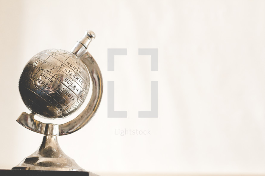 metal globe paper weight 
